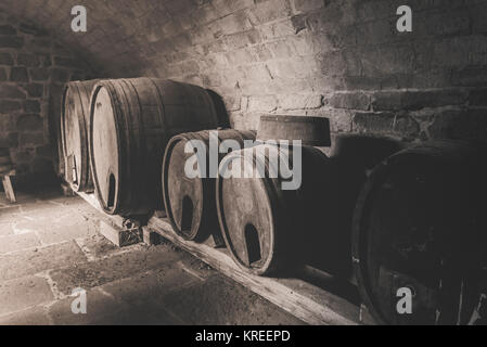 Vintage image with old wooden wine barrels Stock Photo