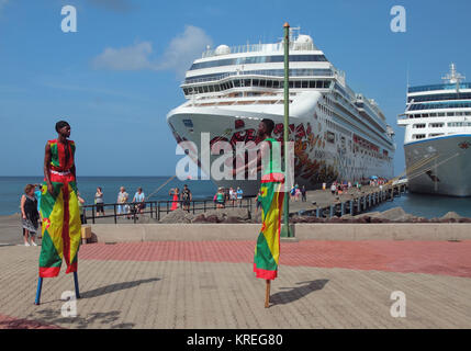 St. George's, Grenada - Nov 08, 2017: Welcome dance on stilts for tourists of cruise liners Stock Photo