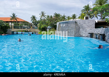 Kota Kinabalu, Malaysia - February 18, 2017: Swimming pool at Shangri-La Hotel and Resort in Sabah Borneo, Malaysia. Stock Photo