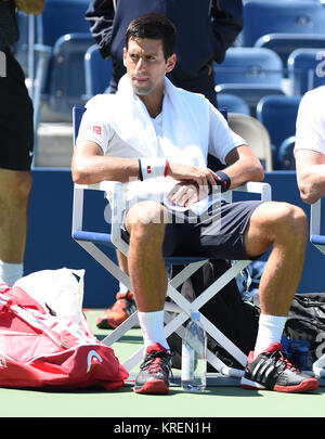 NEW YORK, NY - AUGUST 24: Novak Djokovic is sighted practicing on Arthur Ashe Stadium court at the USTA Billie Jean King National Tennis Center on August 24, 2014 in the Queens borough of New York City.   People:  Novak Djokovic Stock Photo