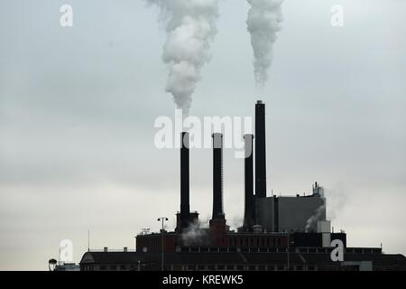 Smoking power plant Stock Photo