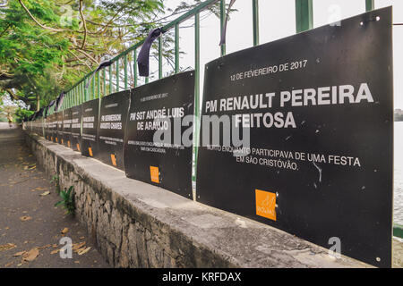 Rio de Janeiro, Brazil. 19th Dec, 2017. A memorial has been set up on the boardwalk of Lagoa Rodrigo de Freitas in Rio de Janeiro, Brazil to honour the police officers that died in the line of duty in 2017, as well as children and adolescents killed by 'lost bullets'. These stray bullets are a common occurrence in Rio de Janeiro, as different drug factions fight for control of territory. The number of murdered Rio de Janeiro police officers in 2017 stands at 129 as of 18/12/2017 Credit: Alexandre Rotenberg/Alamy Live News Stock Photo