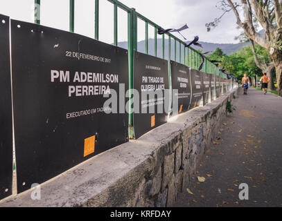 Rio de Janeiro, Brazil. 19th Dec, 2017. A memorial has been set up on the boardwalk of Lagoa Rodrigo de Freitas in Rio de Janeiro, Brazil to honour the police officers that died in the line of duty in 2017, as well as children and adolescents killed by 'lost bullets'. These stray bullets are a common occurrence in Rio de Janeiro, as different drug factions fight for control of territory. The number of murdered Rio de Janeiro police officers in 2017 stands at 129 as of 18/12/2017 Credit: Alexandre Rotenberg/Alamy Live News Stock Photo