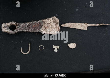 Bet Shemesh, Israel. 20th December, 2017. Iron artifacts discovered on the site of the remains of a Byzantine Period 1,500 year old monastery and church. Decorated with mosaic floors and imported marble elements the compound was uncovered near Bet Shemesh by the Israel Antiquities Authority. Archaeologists continue to uncover more of remains of walls built of large worked stone masonry and a marble pillar base decorated with crosses. Credit: Nir Alon/Alamy Live News Stock Photo