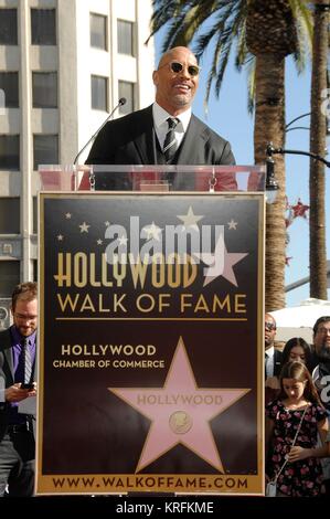 Los Angeles, CA, USA. 13th Dec, 2017. Dwayne Johnson at the induction ceremony for Star on the Hollywood Walk of Fame for Dwayne Johnson, aka THE ROCK, Hollywood Boulevard, Los Angeles, CA December 13, 2017. Credit: Michael Germana/Everett Collection/Alamy Live News Stock Photo