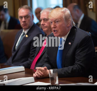 Interior Secretary Ryan Zinke, left, talks with Jefferson Keel, Lt ...