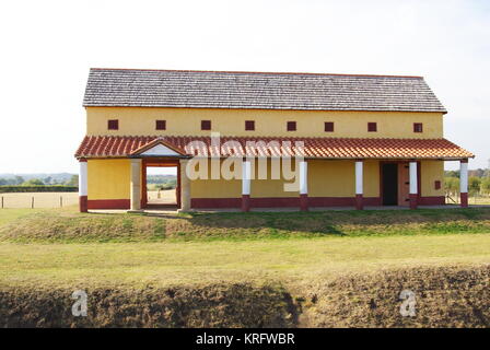 Viroconium Cornoviorum, or Uriconium, remains of a Roman city at Wroxeter, Shropshire. The city was established around AD 58. Showing a modern reconstruction of a Roman villa or town house. Stock Photo