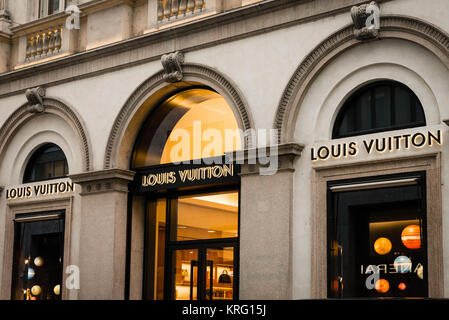 Milan, Italy - October 8, 2016: Shop Window And Entrance Of A Louis Vuitton  Shop In Milan - Montenapoleone Street, Italy. Few Days After Milan Fashion  Week. Fall Winter 2017 Collection. French