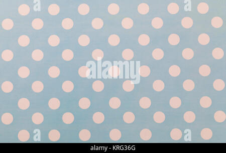 Abstract image of a pale blue paper pattern with white circles. Stock Photo