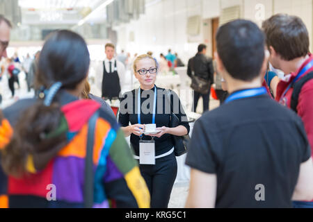 People interacting during coffee break at medical conference. Stock Photo