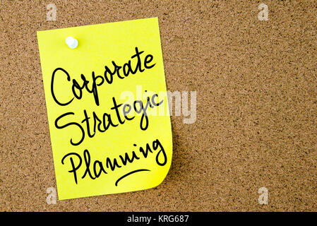 Corporate Strategic Planning text written on yellow paper note Stock Photo