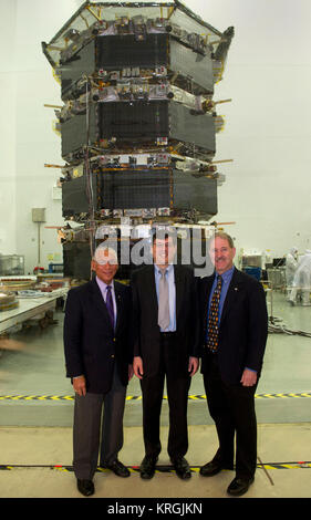 NASA Administrator Charles Bolden got a firsthand look at work being done on the four Magnetospheric Multiscale (MMS) spacecraft during his visit to the agency's Goddard Space Flight Center in Greenbelt, Maryland, on May 12.  Standing 20 feet high inside a Goddard clean room, the spacecraft were in their 'four-stack' formation, similar to how they will be arranged inside their launch vehicle. The MMS spacecraft recently completed vibration testing.  With MMS as a backdrop, Bolden and Goddard Center Director Chris Scolese discussed the mission, ground testing and preparations for launch with pr Stock Photo
