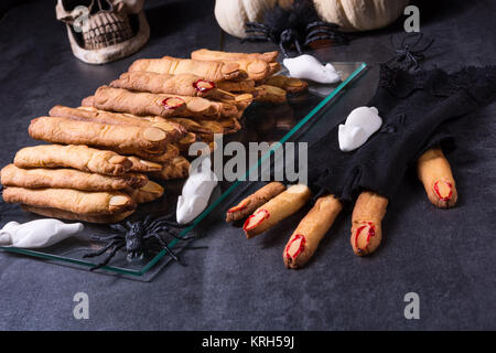 Halloween biscuit finger and cake coffin Stock Photo