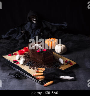 Halloween biscuit finger and cake coffin Stock Photo