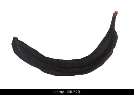 Black dry banana on white background Stock Photo
