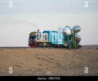 The Soyuz TMA-14M spacecraft is rolled out to the launch pad by train on Tuesday, Sept. 23, 2014 at the Baikonur Cosmodrome in Kazakhstan.  Launch of the Soyuz rocket is scheduled for Sept. 26 and will carry Expedition 41 Soyuz Commander Alexander Samokutyaev of the Russian Federal Space Agency (Roscosmos), Flight Engineer Barry Wilmore of NASA, and Flight Engineer Elena Serova of Roscosmos into orbit to begin their five and a half month mission on the International Space Station. Photo Credit: (NASA/Aubrey Gemignani) Expedition 41 Rollout (201409230018HQ) Stock Photo
