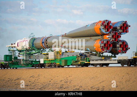 The Soyuz TMA-14M spacecraft is rolled out to the launch pad by train on Tuesday, Sept. 23, 2014 at the Baikonur Cosmodrome in Kazakhstan.  Launch of the Soyuz rocket is scheduled for Sept. 26 and will carry Expedition 41 Soyuz Commander Alexander Samokutyaev of the Russian Federal Space Agency (Roscosmos), Flight Engineer Barry Wilmore of NASA, and Flight Engineer Elena Serova of Roscosmos into orbit to begin their five and a half month mission on the International Space Station. Photo Credit: (NASA/Aubrey Gemignani) Expedition 41 Rollout (201409230023HQ) Stock Photo