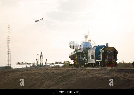 The Soyuz TMA-14M spacecraft is rolled out to the launch pad by train on Tuesday, Sept. 23, 2014 at the Baikonur Cosmodrome in Kazakhstan.  Launch of the Soyuz rocket is scheduled for Sept. 26 and will carry Expedition 41 Soyuz Commander Alexander Samokutyaev of the Russian Federal Space Agency (Roscosmos), Flight Engineer Barry Wilmore of NASA, and Flight Engineer Elena Serova of Roscosmos into orbit to begin their five and a half month mission on the International Space Station. Photo Credit: (NASA/Aubrey Gemignani) Expedition 41 Rollout (201409230026HQ) Stock Photo