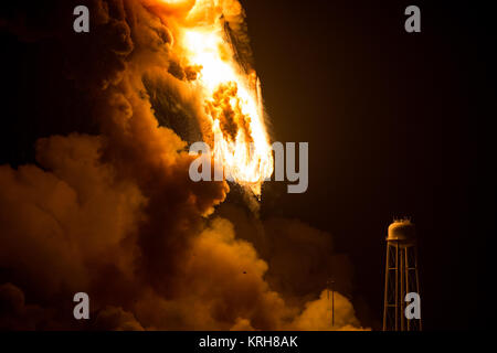 The Orbital ATK Antares rocket, with the Cygnus spacecraft onboard suffers a catastrophic anomaly moments after launch from the Mid-Atlantic Regional Spaceport Pad 0A, Tuesday, Oct. 28, 2014, at NASA's Wallops Flight Facility in Virginia. The Cygnus spacecraft was filled with supplies slated for the International Space Station, including science experiments, experiment hardware, spare parts, and crew provisions. Photo Credit: (NASA/Joel Kowsky) Orbital ATK Antares Launch (201410280035HQ) Stock Photo