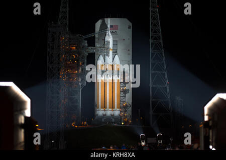 A United Launch Alliance Delta IV Heavy rocket with NASA’s Orion spacecraft mounted atop is seen after the Mobile Service Tower was finished rolling back early on Thursday, Dec. 4, 2014, at Cape Canaveral Air Force Station's Space Launch Complex 37, Florida. Orion is scheduled to make its first flight test on Dec. 4 with a morning launch atop the Delta IV Heavy. The spacecraft will orbit Earth twice, reaching an altitude of approximately 3,600 miles above Earth before landing in the Pacific Ocean. No one will be aboard Orion for this flight test, but the spacecraft is designed to allow us to j Stock Photo