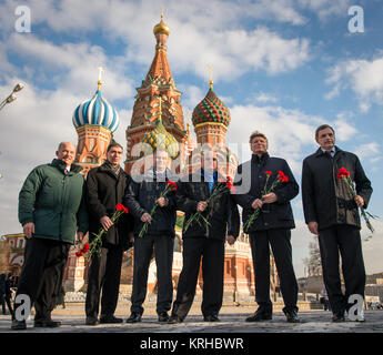 Expedition 43 prime and backup crews pose for a photograph together in front of St. Basil's Cathedral in Moscow as part of traditional pre-launch ceremonies, from left,  Expedition 43 backup crew members; NASA Astronaut Jeff Williams, Russian cosmonaut Sergei Volkov of the Russian Federal Space Agency (Roscosmos), Russian cosmonaut Alexei Ovchinin of Roscosmos, Expedition 43 prime crew members; NASA Astronaut Scott Kelly, Russian cosmonaut Gennady Padalka of Roscosmos, and Russian cosmonaut Mikhail Kornienko of Roscosmos, Friday, March 6, 2015. Kelly, Padalka, and Kornienko are  preparing for  Stock Photo