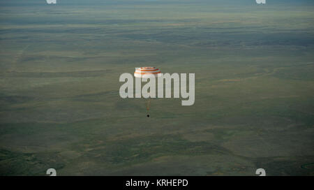 The Soyuz TMA-15M spacecraft is seen as it lands with Expedition 43 commander Terry Virts of NASA, cosmonaut Anton Shkaplerov of the Russian Federal Space Agency (Roscosmos), and Italian astronaut Samantha Cristoforetti from European Space Agency (ESA) near the town of Zhezkazgan, Kazakhstan on Thursday, June 11, 2015. Virtz, Shkaplerov, and Cristoforetti are returning after more than six months onboard the International Space Station where they served as members of the Expedition 42 and 43 crews. Photo Credit: (NASA/Bill Ingalls) Expedition 43 Soyuz TMA-15M Landing (201506110036HQ) Stock Photo