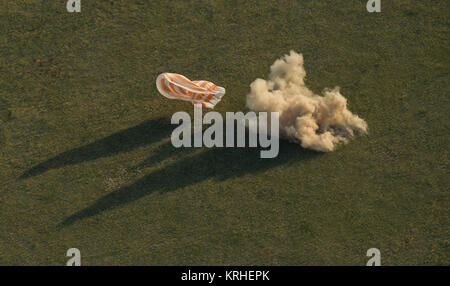 The Soyuz TMA-15M spacecraft is seen as it lands with Expedition 43 commander Terry Virts of NASA, cosmonaut Anton Shkaplerov of the Russian Federal Space Agency (Roscosmos), and Italian astronaut Samantha Cristoforetti from European Space Agency (ESA) near the town of Zhezkazgan, Kazakhstan on Thursday, June 11, 2015. Virtz, Shkaplerov, and Cristoforetti are returning after more than six months onboard the International Space Station where they served as members of the Expedition 42 and 43 crews. Photo Credit: (NASA/Bill Ingalls) Expedition 43 Soyuz TMA-15M Landing (201506110039HQ) Stock Photo