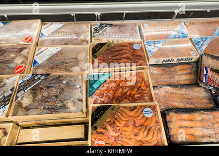 Frozen king prawns, langoustines and seafood in a Spanish supermarket Stock Photo