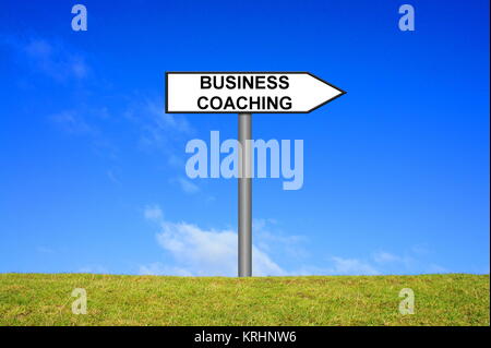 signpost sign showing busness coaching Stock Photo