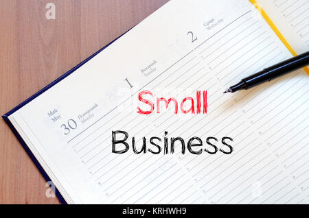 Small business text concept on notebook Stock Photo