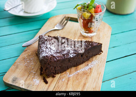 Chocolate cake with fruits salad Stock Photo