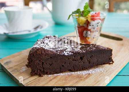 Chocolate cake with fruits salad Stock Photo