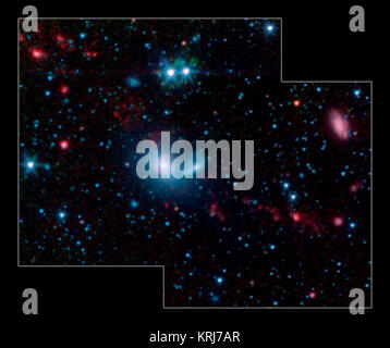 This false-color infrared image from NASA's Spitzer Space Telescope shows little 'dwarf galaxies' forming in the 'tails' of two larger galaxies that are colliding together. The big galaxies are at the center of the picture, while the dwarfs can be seen as red dots in the red streamers, or tidal tails. The two blue dots above the big galaxies are stars in the foreground.  Galaxy mergers are common occurrences in the universe; for example, our own Milky Way galaxy will eventually smash into the nearby Andromeda galaxy. When two galaxies meet, they tend to rip each other apart, leaving a trail, c Stock Photo