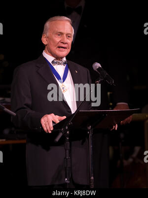 Apollo 11 Astronaut Buzz Aldrin reads an introduction to Gustav Holst: The Planets Suite during the 'Salute to Apollo' ceremony at the Kennedy Center for the Performing Arts, Saturday, July 18, 2009 in Washington.  The event was part of NASA's week long celebration of the Apollo 40th Anniversary.  Photo Credit: (NASA/Bill Ingalls) Buzz Aldrin at 22Salute to Apollo22 Stock Photo