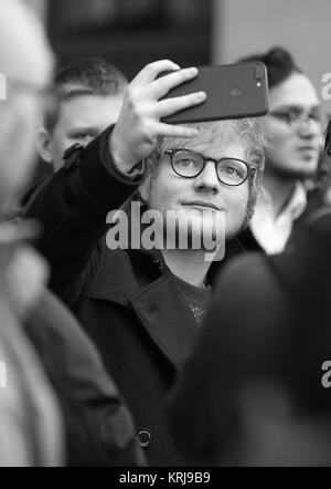 London, UK. 12th December, 2017. ( Image digitally altered to monochrome ) Ed Sheeran seen seen at the BBC Radio One Studios in London Stock Photo