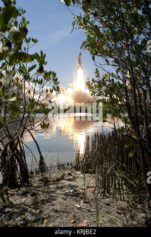 CAPE CANAVERAL, Fla. - Space shuttle Atlantis rumbles the Space Coast as it clears the tower at its pristine launch complex, which is home to the Merritt Island National Wildlife Refuge. Liftoff from NASA Kennedy Space Center's Launch Pad 39A occurred right on time at 2:20 p.m. EDT on May 14. Atlantis' primary payload for the STS-132 mission is the Russian-built Mini Research Module-1, which will provide additional storage space and a new docking port for Russian Soyuz and Progress spacecraft aboard the International Space Station. STS-132 is the 132nd shuttle flight, the 32nd for Atlantis and Stock Photo