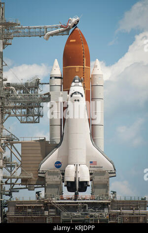 The space shuttle Endeavour is seen on launch pad 39a after the rollback of the Rotating Service Structure (RSS), Sunday, May 15, 2011, at Kennedy Space Center in Cape Canaveral, Fla. During the mission, Endeavour and the STS-134 crew will deliver the Alpha Magnetic Spectrometer (AMS) and spare parts including two S-band communications antennas, a high-pressure gas tank and additional spare parts for Dextre. Launch is targeted for Monday, May 16 at 8:56 a.m. EDT.  Photo credit: (NASA/Bill Ingalls) SS Endeavour STS134 on launch pad (facing shuttle) Stock Photo