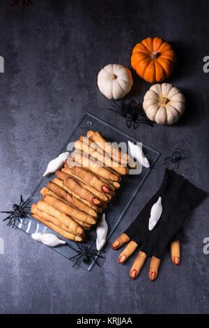 Halloween biscuit finger and cake coffin Stock Photo