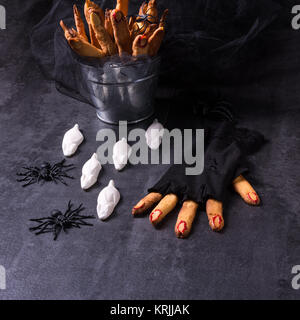 Halloween biscuit finger and cake coffin Stock Photo