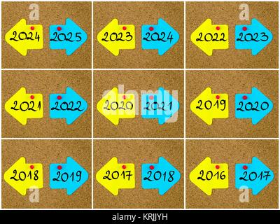 Antonym concepts of new year versus old year written on opposite arrows Stock Photo