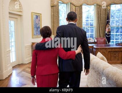 U.S. Supreme Court Justice Elena Kagan (left) and U.S. President Barack Obama walk into the White House Oval Office August 6, 2010 in Washington, DC. Stock Photo