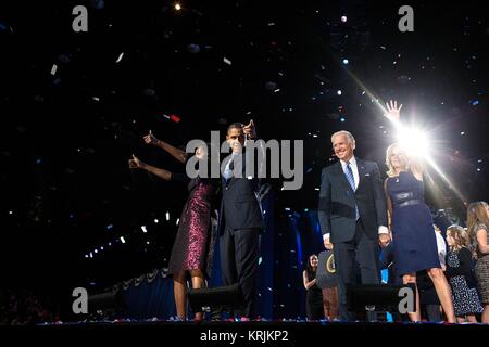 U.S. First Lady Michelle Obama, U.S. President Barack Obama, U.S. Vice President Joe Biden, and U.S. Second Lady Jill Biden interact with the crowd after the Presidents election night speech at the McCormick Place November 6, 2012 in Chicago, Illinois. Stock Photo