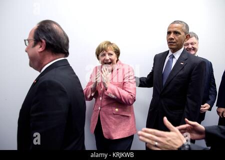 German Chancellor Angela Merkel and U.S. President Barack Obama line up for a group photo with European leaders July 9, 2016 in Warsaw, Poland. Stock Photo