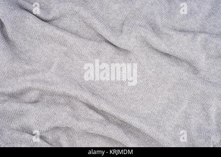 close up grey knitted pullover background Stock Photo