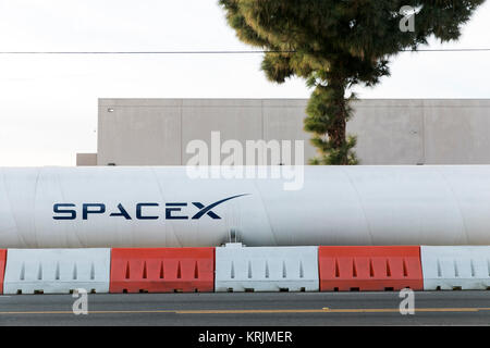 A logo sign on a Hyperloop test track outside of the headquarters of Space Exploration Technologies Corp., also known as SpaceX, in Hawthorne, Califor Stock Photo