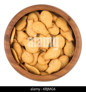Cracker in a wooden bowl isolated on white background. Stock Photo