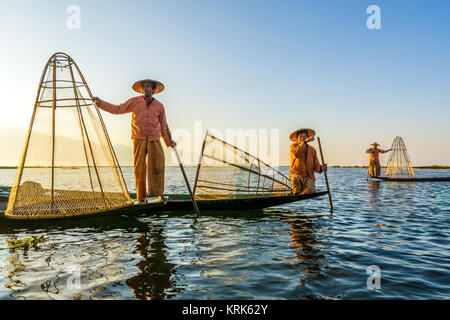Fishermen at sunrise in the Landscape on the Inle Lake in the Shan State in the east of Myanmar in Southeastasia, myanmar, inle lake Stock Photo