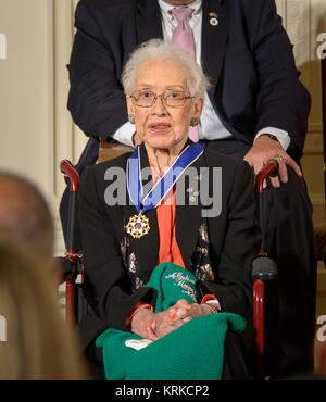 Former NASA mathematician Katherine Johnson is seen after President Barack Obama presented her with the Presidential Medal of Freedom, Tuesday, Nov. 24, 2015, during a ceremony in the East Room of the White House in Washington. Photo Credit: (NASA/Bill Ingalls)  Johnson's computations have influenced every major space program from Mercury through the Shuttle program. Johnson was hired as a research mathematician at the Langley Research Center with the National Advisory Committee for Aeronautics (NACA), the agency that preceded NASA, after they opened hiring to African-Americans and women. John Stock Photo