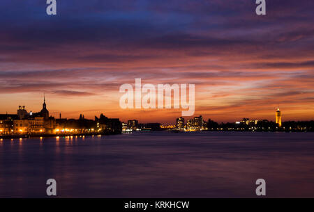 Spectacular sunset above the skylines from Dordrecht and Zwijndrecht Stock Photo