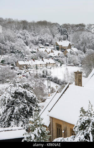 Chedworth village in the december snow. Chedworth, Cotswolds, Gloucestershire, England Stock Photo